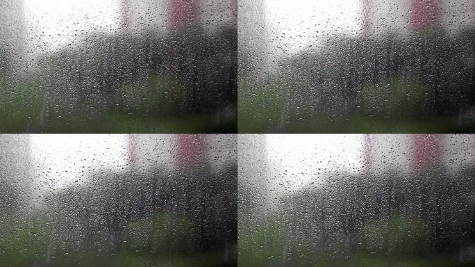 雨滴落在窗户上透明玻璃窗户风光视频素材