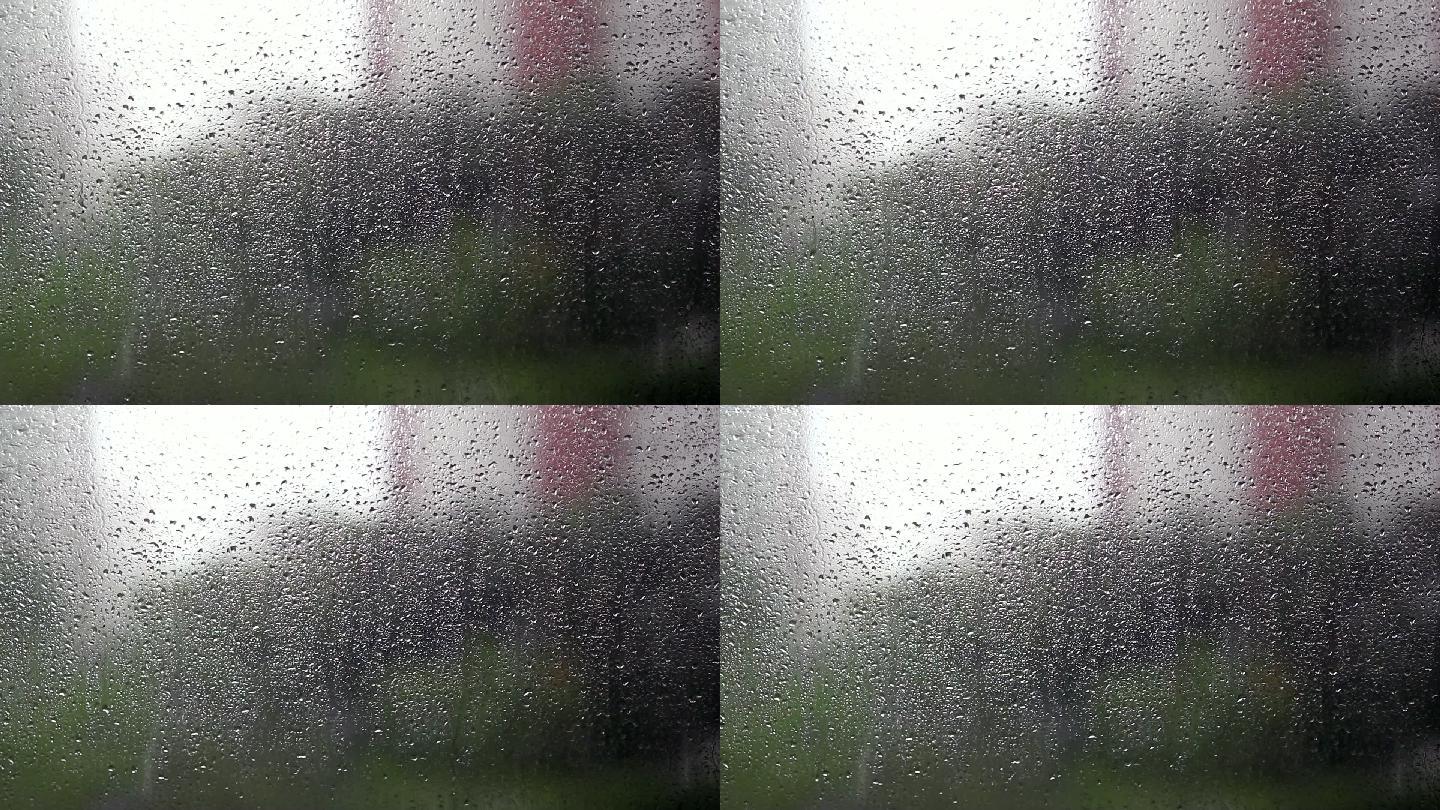 雨滴落在窗户上透明玻璃窗户风光视频素材