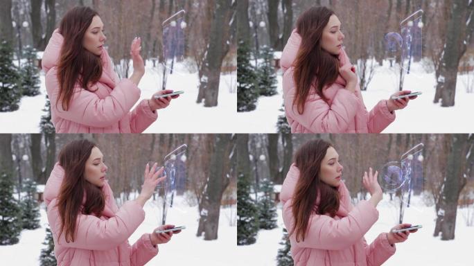 一位年轻女子在冬季公园与HUD全息图互动