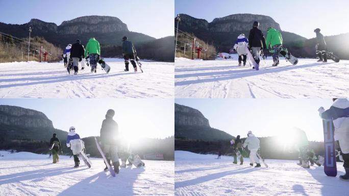 滑雪多人逆光中说笑友谊冬奥素材爬山