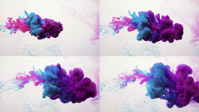 水蓝粉紫烟云油漆在水中喷射