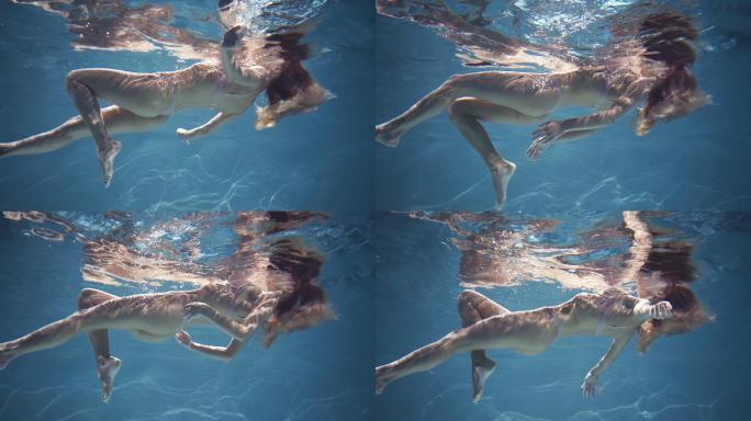 水里漂浮的女人潜泳旅游旅行海水湖水