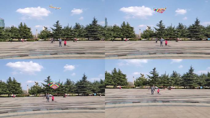 潍坊人民广场放风筝小孩大人慢动作