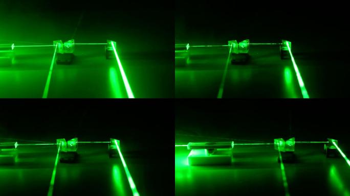 绿色激光通过光学元件传播。
