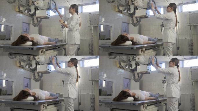 女医生在医院诊断室为女孩操作医用x光机