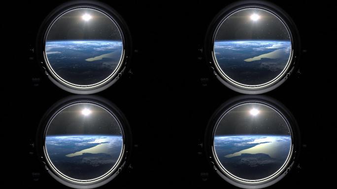 从太空船舷窗看地球。