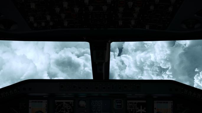 一架飞机驾驶舱的视图，直接穿过云层飞行