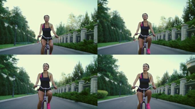 骑自行车的女子运力体育爱好骑单车