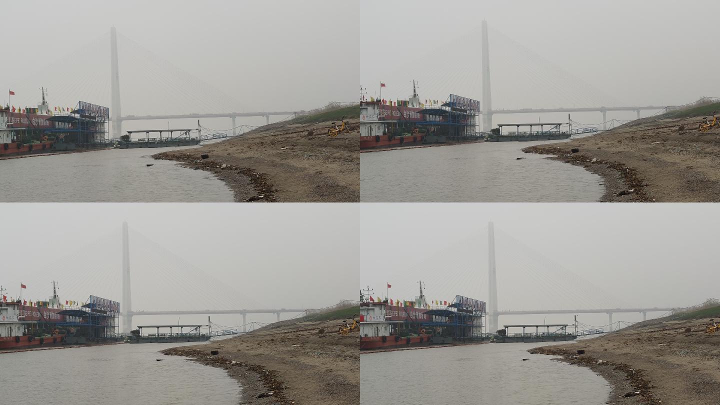 阴天雾霾长江大桥轮船河岸武汉轮渡汽车经过
