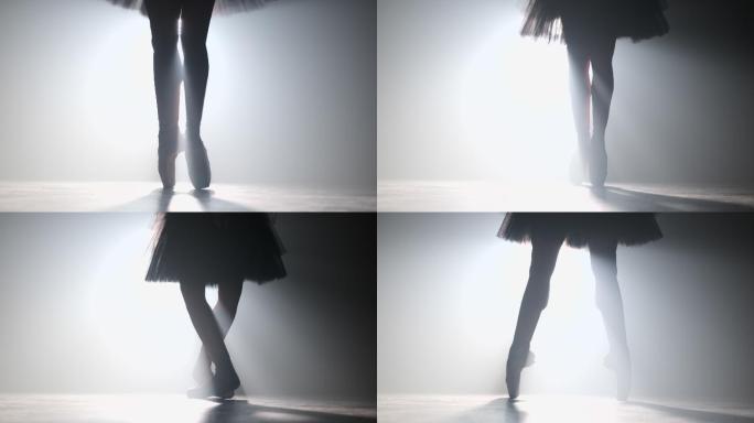 芭蕾舞演员穿着短裙的腿部特写剪影