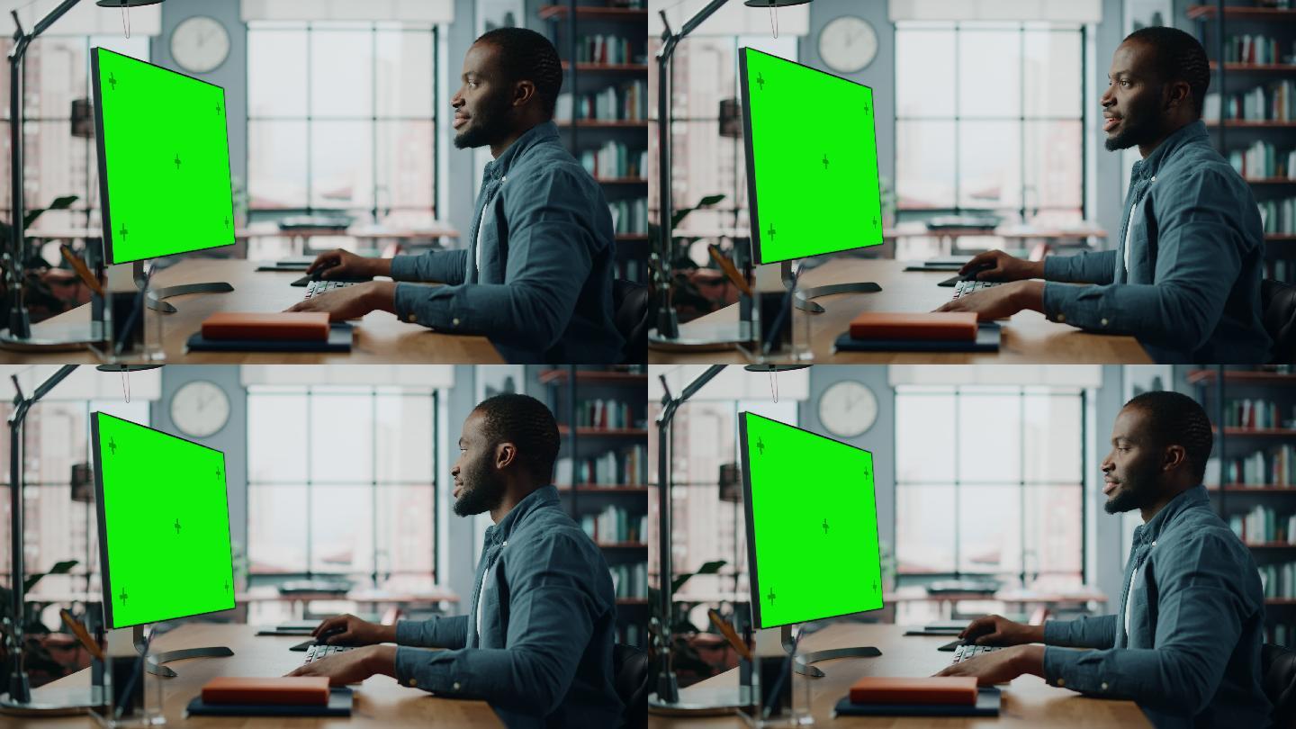 男人通过绿屏电脑与客户聊天。