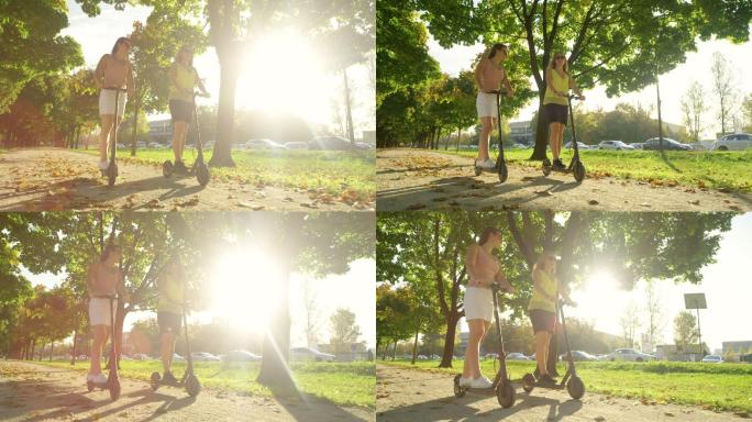 阳光照射在公园里骑电动踏板车的朋友身上