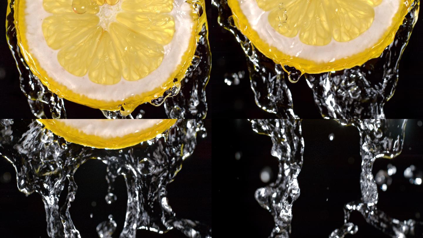 水沿着新鲜的柠檬水果片向下流动