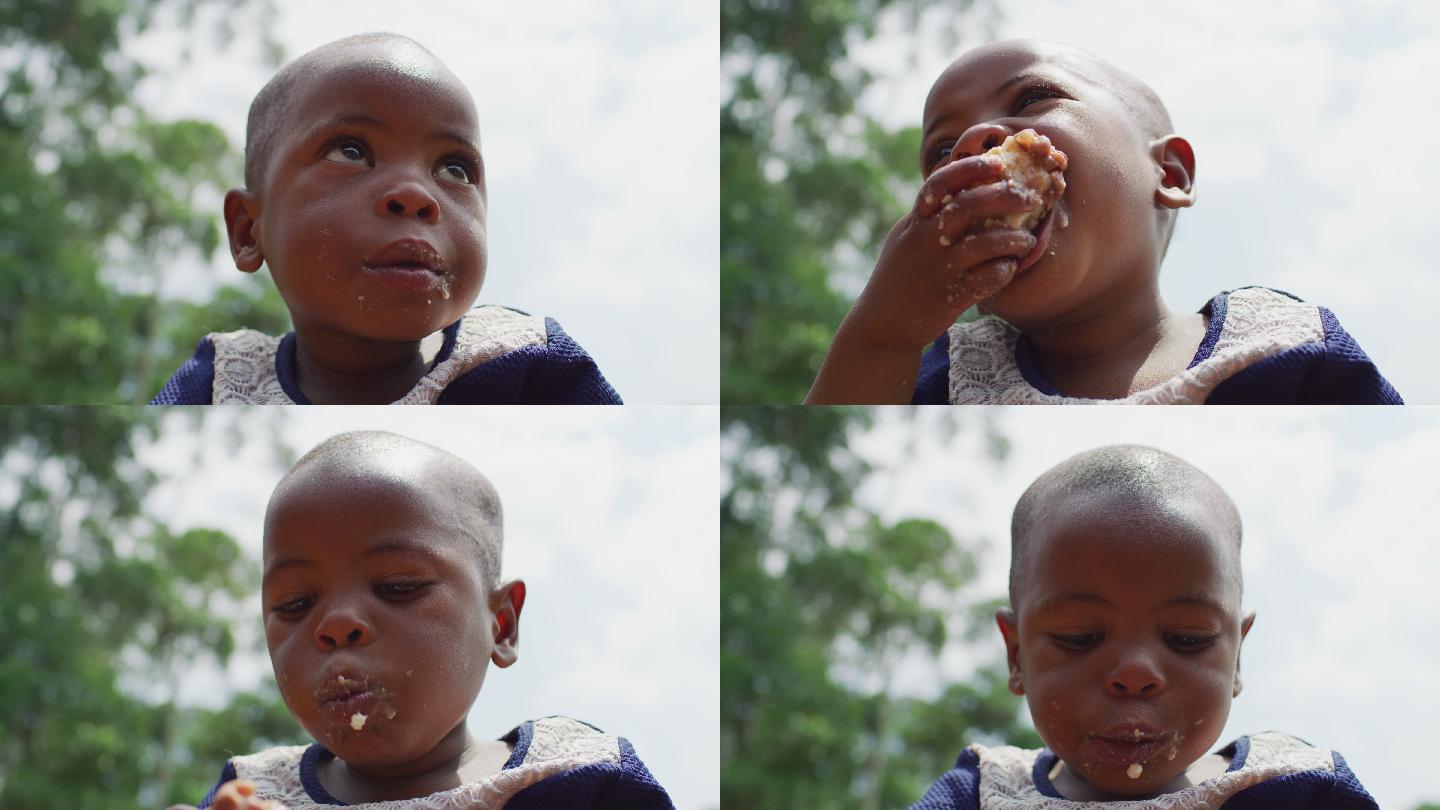 一个小孩吃东西的特写镜头