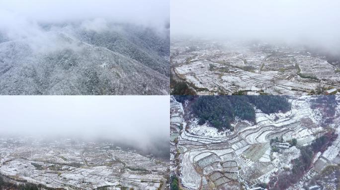 航拍雪中山谷梯田云雾