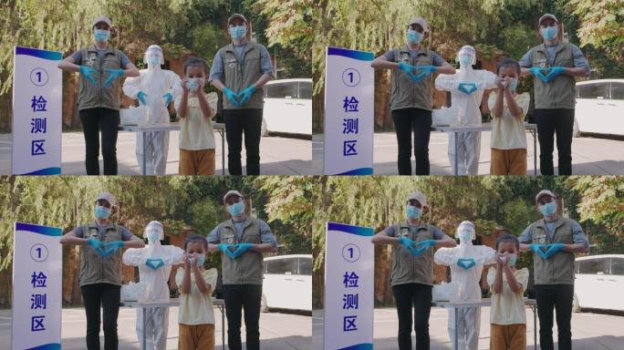 小女孩和医护人员比爱心