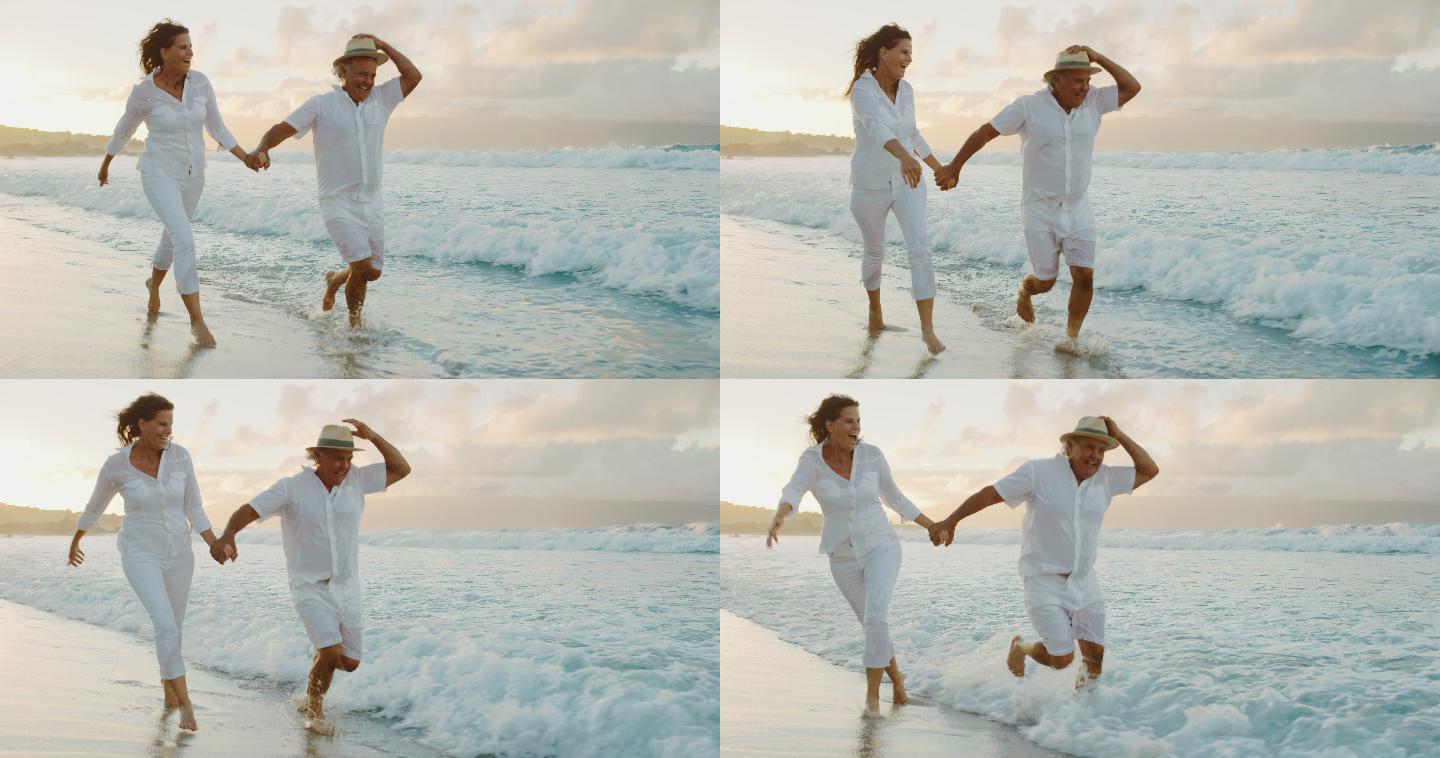 浪漫的中年夫妇在度假时漫步在海滩上