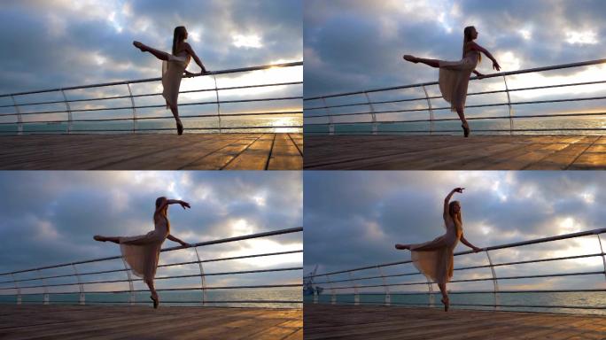芭蕾舞演员在海堤上跳舞