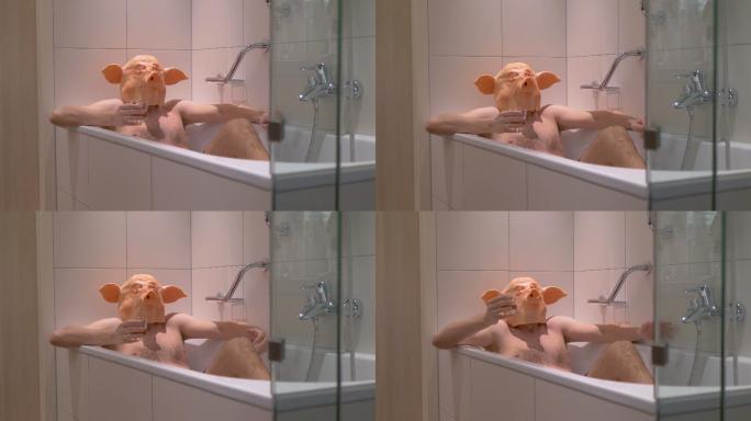 戴着猪面具的男人在浴缸里喝鸡尾酒