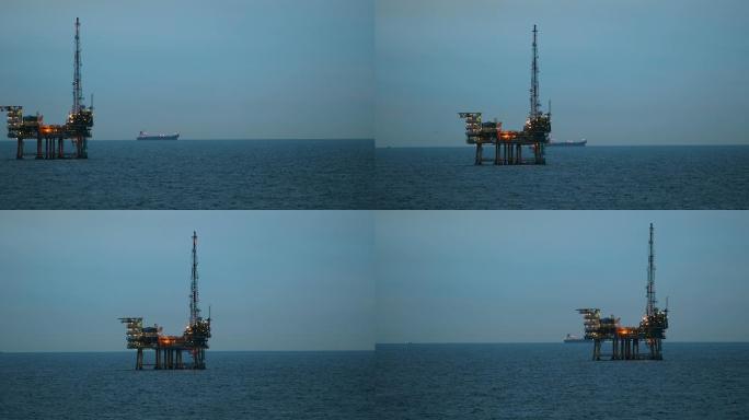 黄昏的海上石油钻机