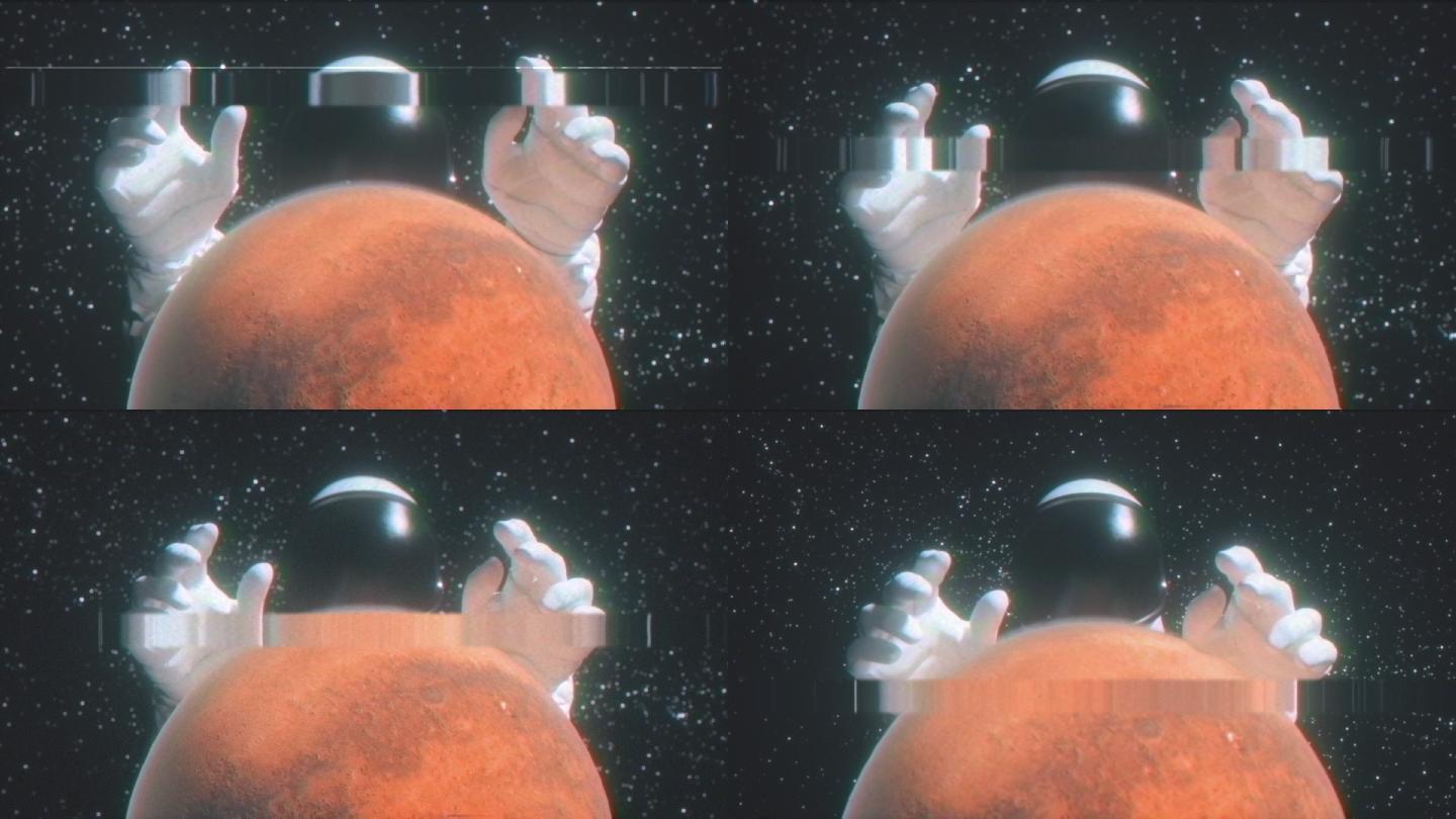 一名宇航员把手伸向火星后面