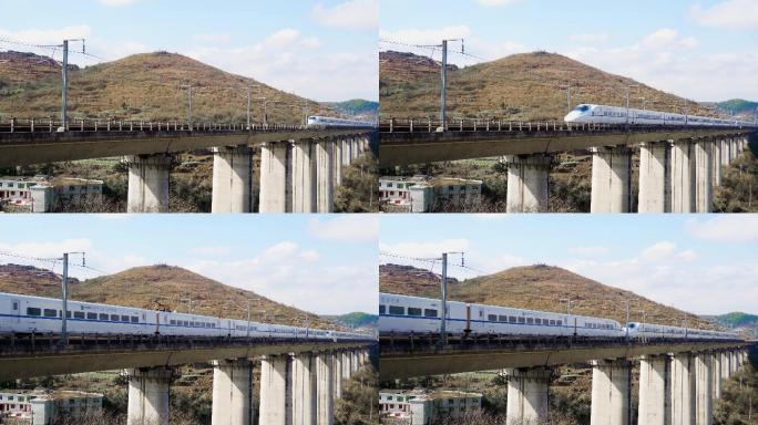 和谐号高铁快速通过桥梁中国高铁建设