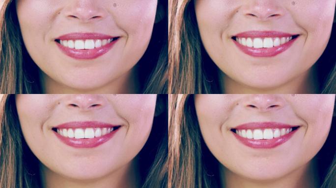 女子微笑时露出洁白的牙齿