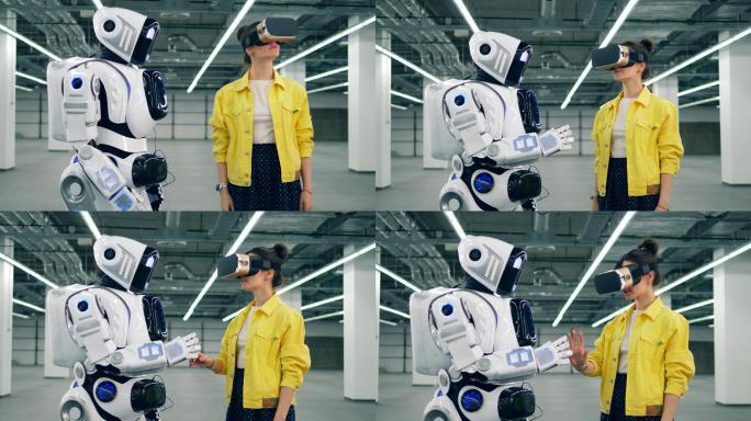 一个戴着虚拟现实眼镜的女孩正在触摸机器人