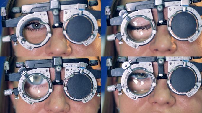 光学试验架后面的女性眼睛特写图。