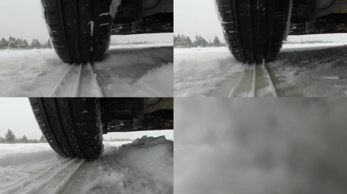 雪地上的汽车轮胎转动