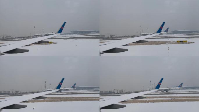 下雪天飞机滑行机内视角