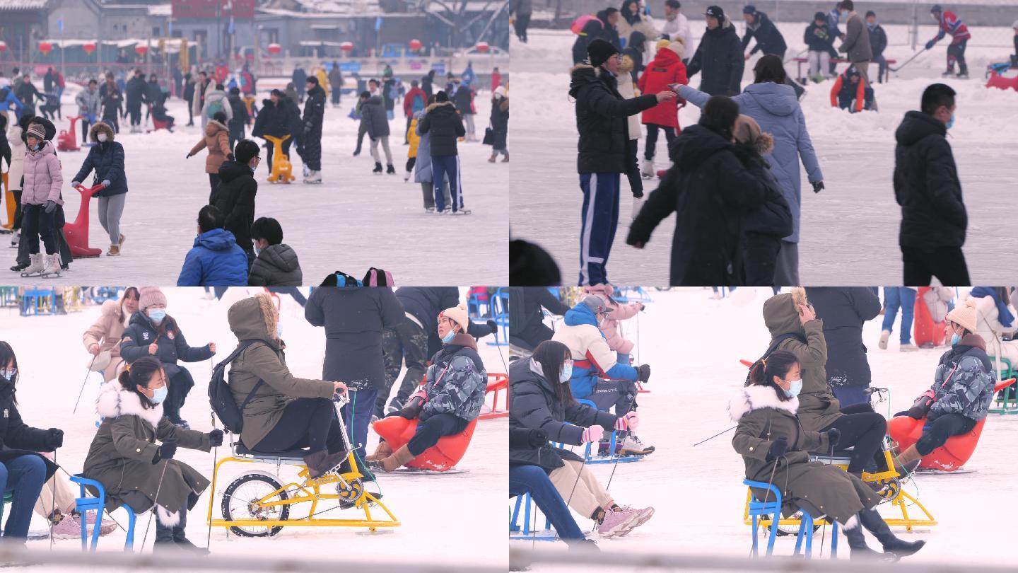北京冬季什刹海冰上滑雪溜冰的游人
