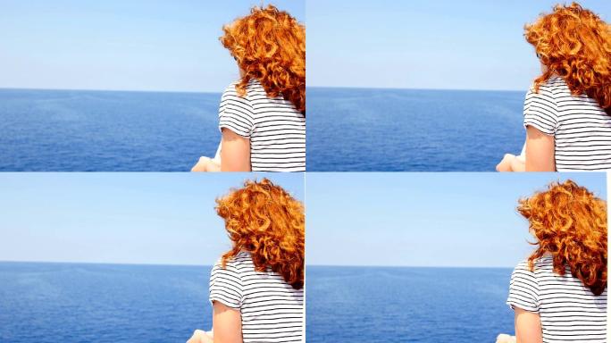 沉思的女人从船上看海