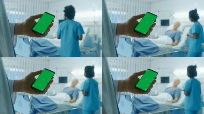 医生手持绿色屏幕手机，背景是病人躺在床上