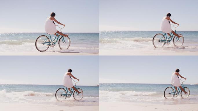 骑自行车的女人文艺清新女生骑车浪潮海浪