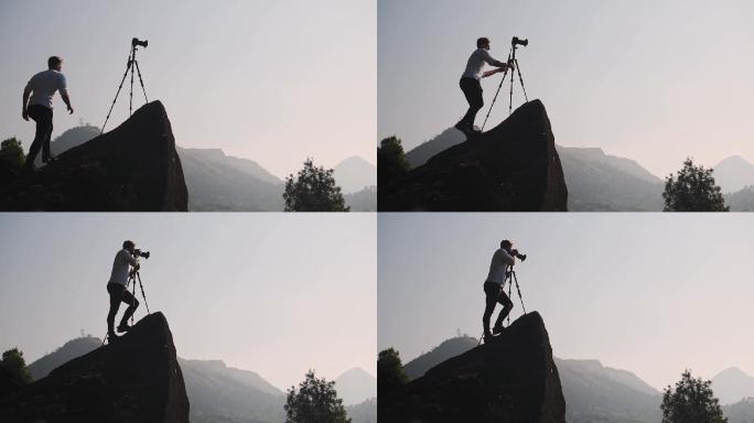 一位风景摄影师在旅行时使用三脚架拍摄