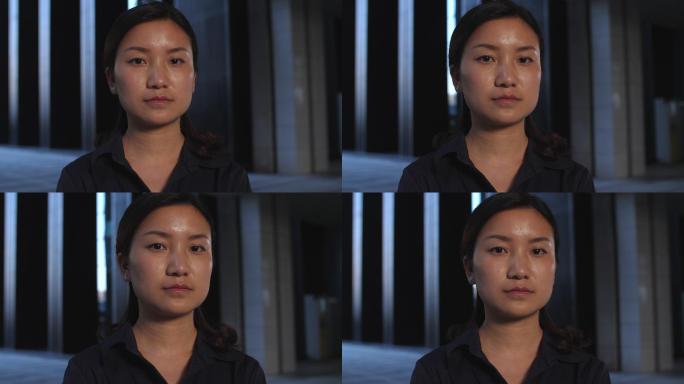 严肃的年轻女子慢镜头特写