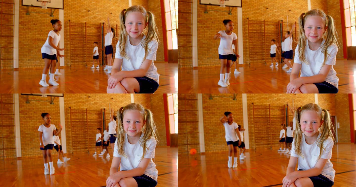 练习篮球的小学生女童女孩快乐健康教育体育