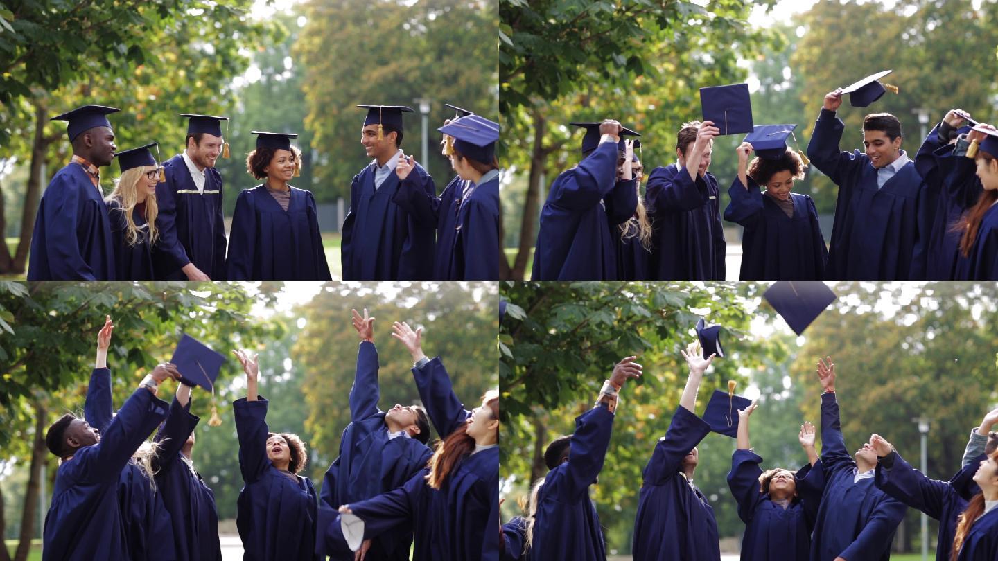 一群穿着学士学位服的学生在投掷帽子