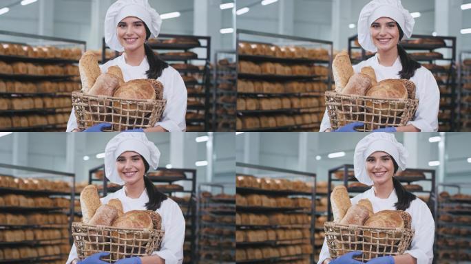 在一家大型面包店的女子拿着烤面包