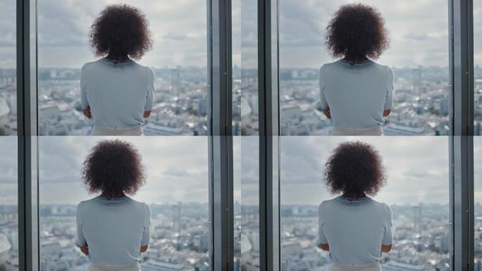 眺望远方的女商人宣传片广告视频素材窗外风