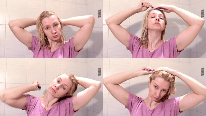 女人在浴室里用梳子梳湿头发
