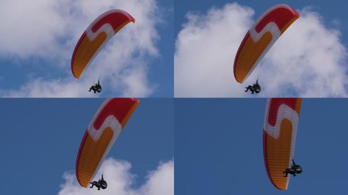 两个人驾驶滑翔伞。
