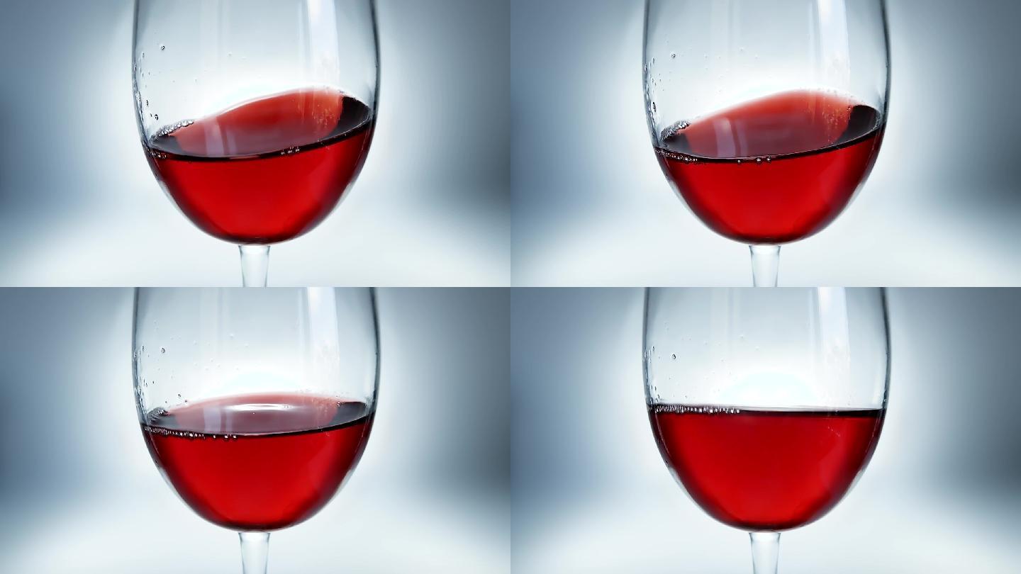红酒在玻璃杯中摇晃