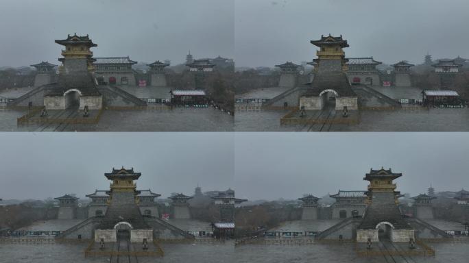 航拍襄阳唐城景区冬天下雪景风光