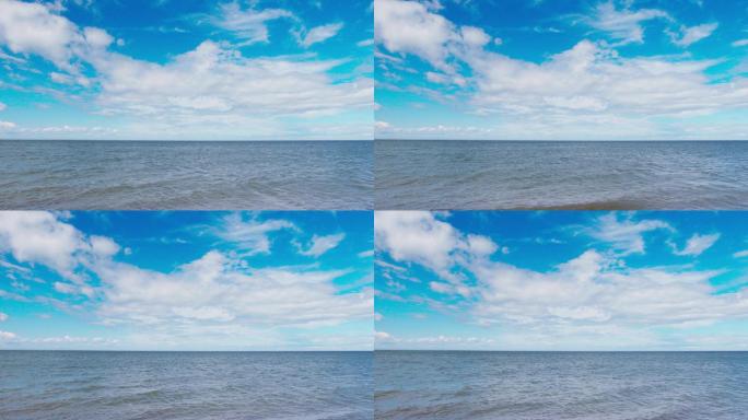 夏天白天的河流蓝天白云海平面海岸线