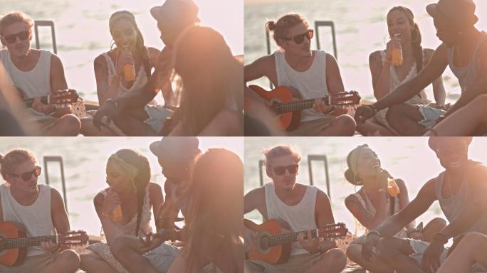 朋友们在码头上弹吉他和聊天