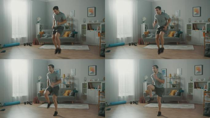 穿着T恤和短裤的运动型男士在家里锻炼