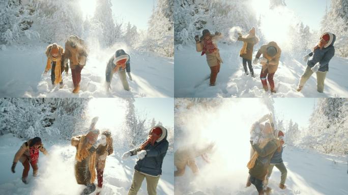在玩雪的几个人打雪仗大雪小朋友玩雪