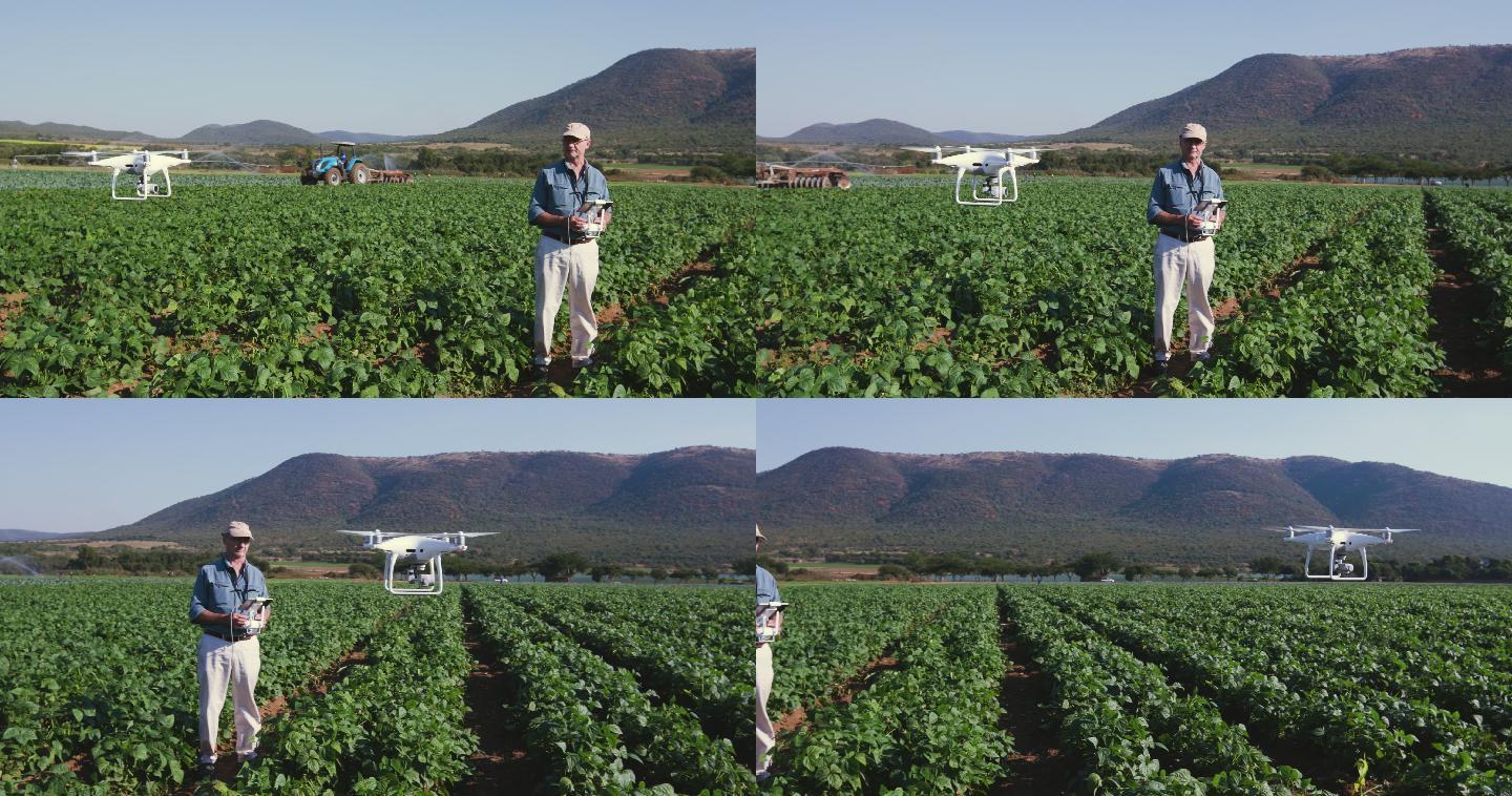 一位农民用无人机监控他的蔬菜作物